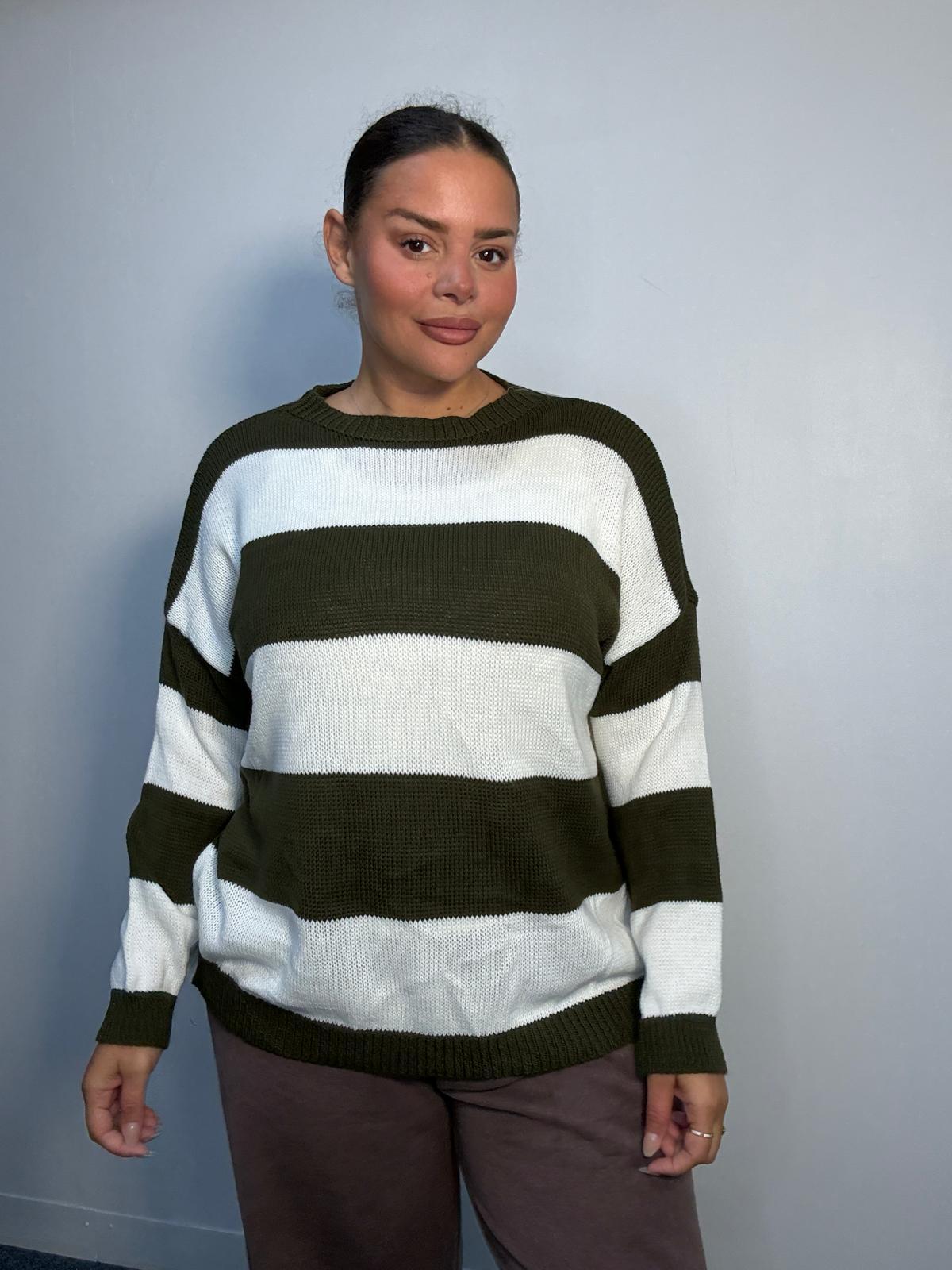 Plus-size model wearing a khaki green and white horizontally striped knitted jumper with round neckline, long sleeves and ribbed trims.