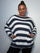 Plus Size Model wearing blue and white striped jumper showing the jumper from the front