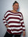 Plus Size Model wearing burgundy and white striped jumper showing the jumper from the front